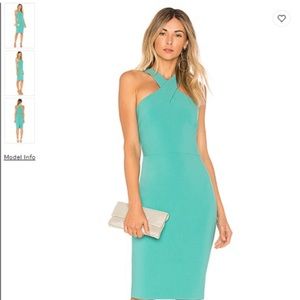 Teal crisscross halter top cocktail dress